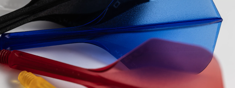 Close-up of colourful solo integrated flight and shaft sets on a white background