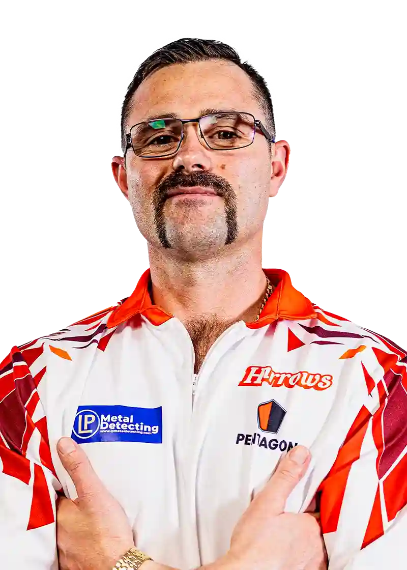Damon Heta wearing a red and white Harrows Player shirt with visible branding on a white background