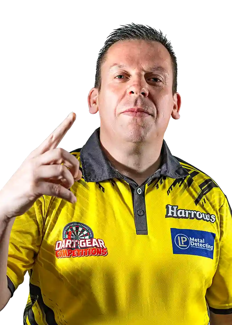 Dave Chisnall wearing a Harrows Player yellow shirt with various logos, pointing upwards.